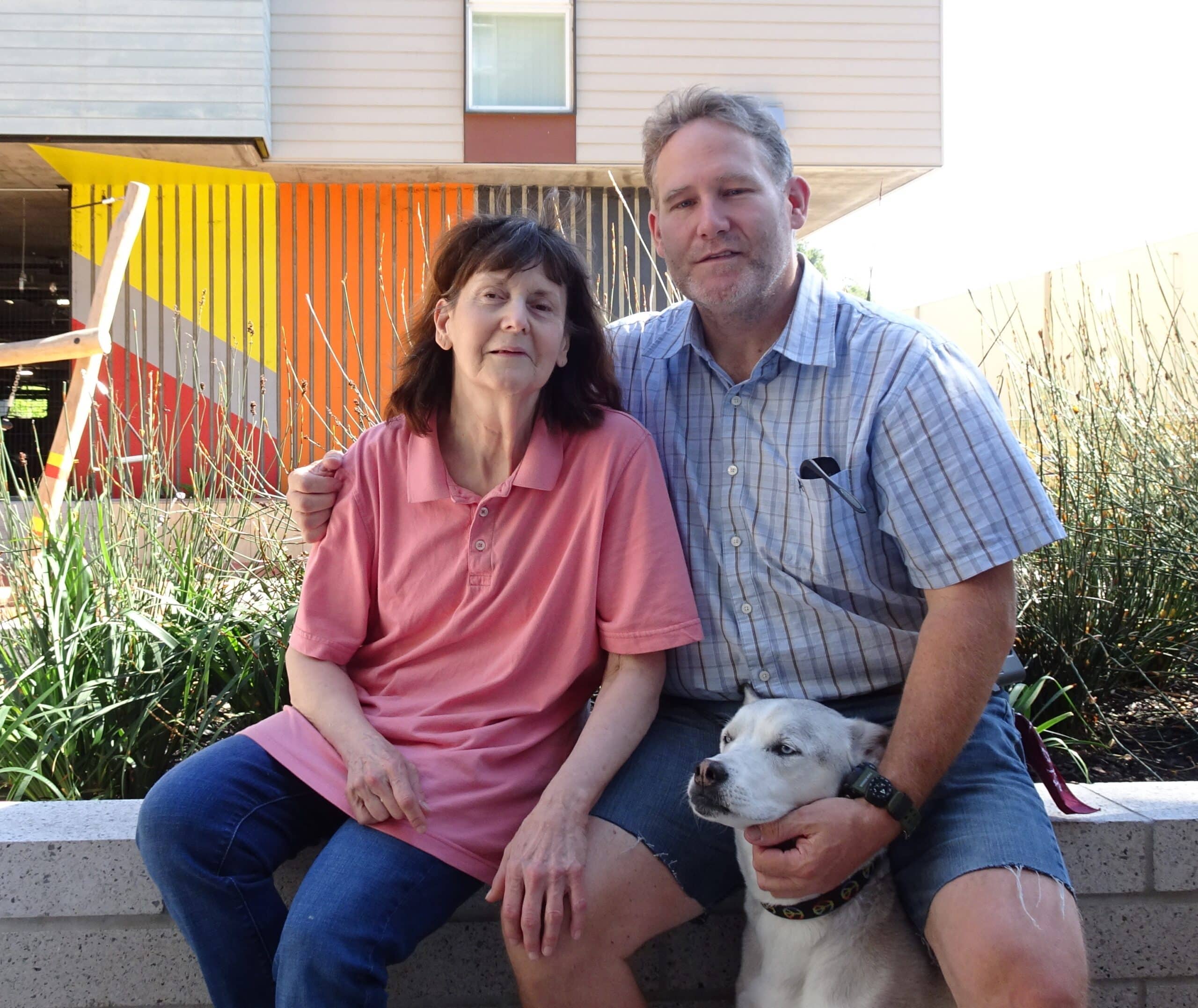 Phillip and Marjorie - with their dog Sasha - at home at Edwina Benner Plaza in Sunnyvale